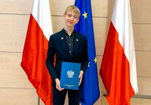 Uczeń naszej szkoły podczas podsumowania Konkursów Przedmiotowych.
